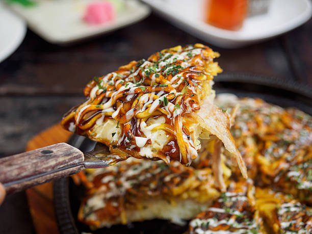 Affordable Delicious Japanese Food- 
 Okonomiyaki: A Savory Pancake Extravaganza